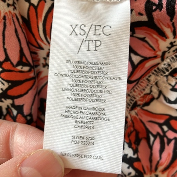 Cabi Seraphina #5730 Daisy ruffled flowy top over spaghetti strapped B&W tank. - Picture 10 of 10